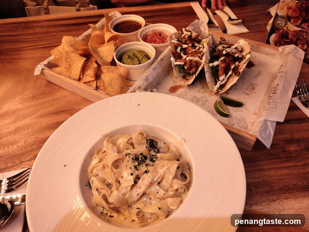 Fettuccine Alfredo and Tacos Meal