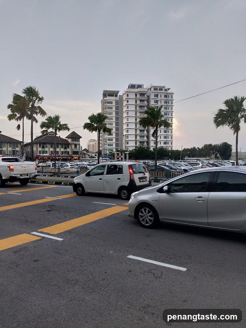 Parking Lot with Buildings and Palm Trees