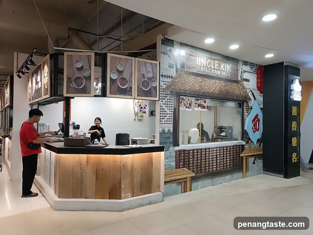 Food Stall Interior with Staff and Signage