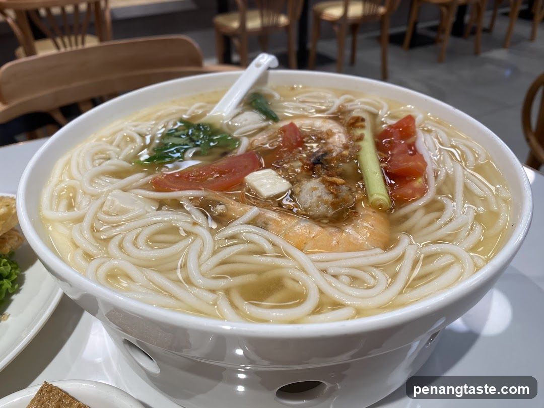 Bowl of Noodle Soup with Shrimp and Vegetables