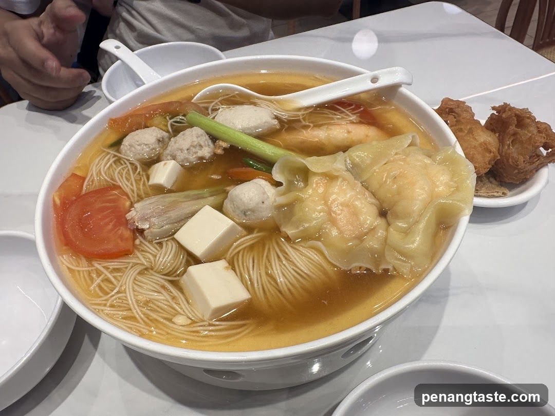 Noodle Soup with Dumplings and Fried Food