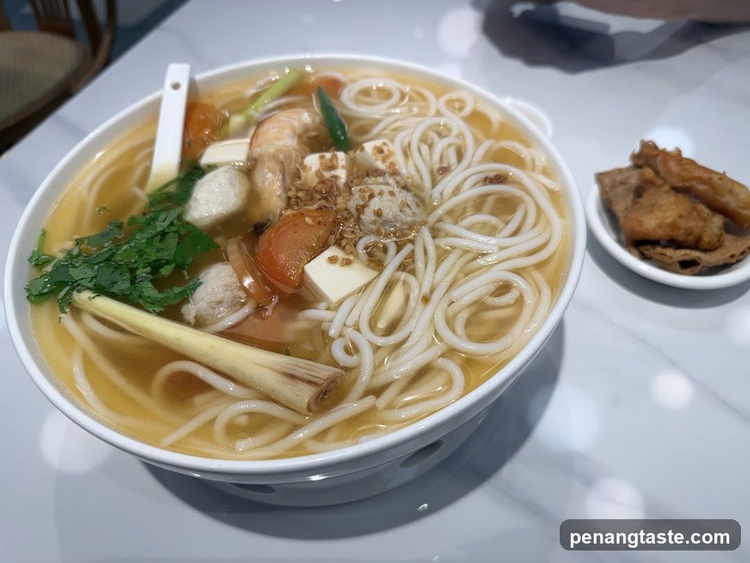 Bowl of Noodle Soup with Side Dish