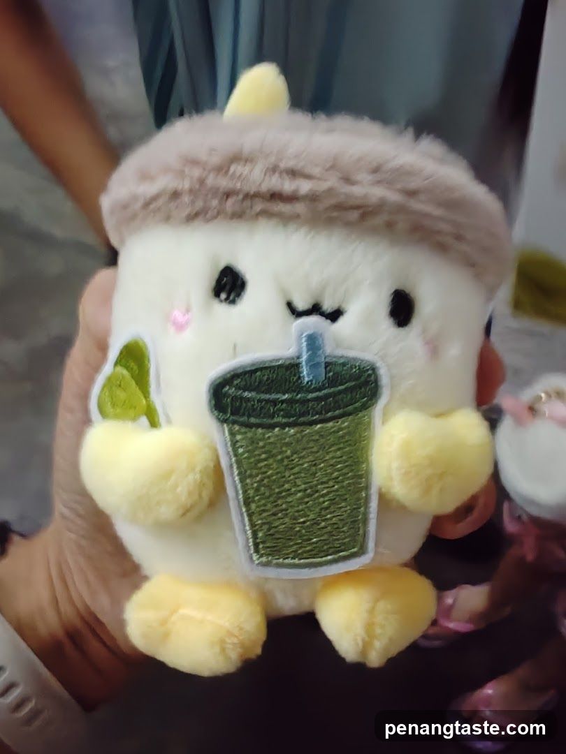 Plush Toy Holding Green Drink