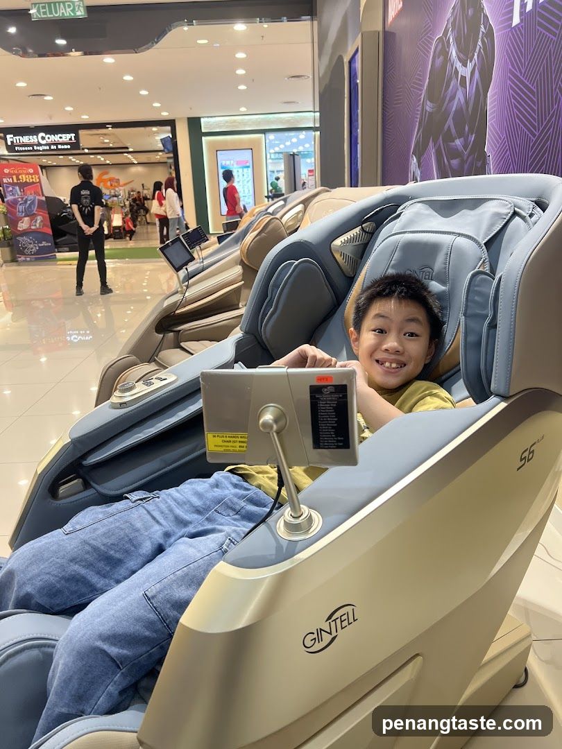Boy in Massage Chair at Mall