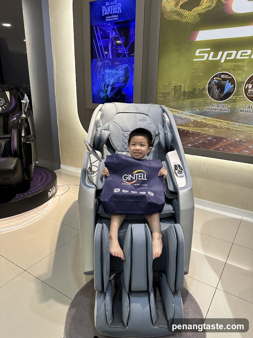 Child in Massage Chair with Gift Bag
