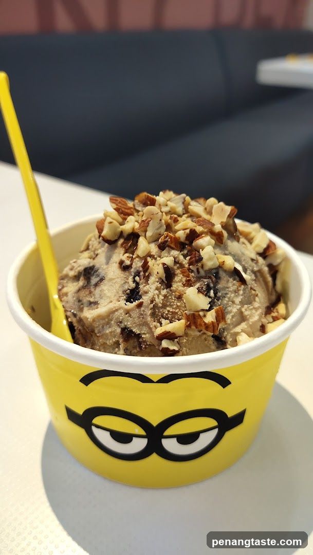 Minion-themed ice cream cup with nuts