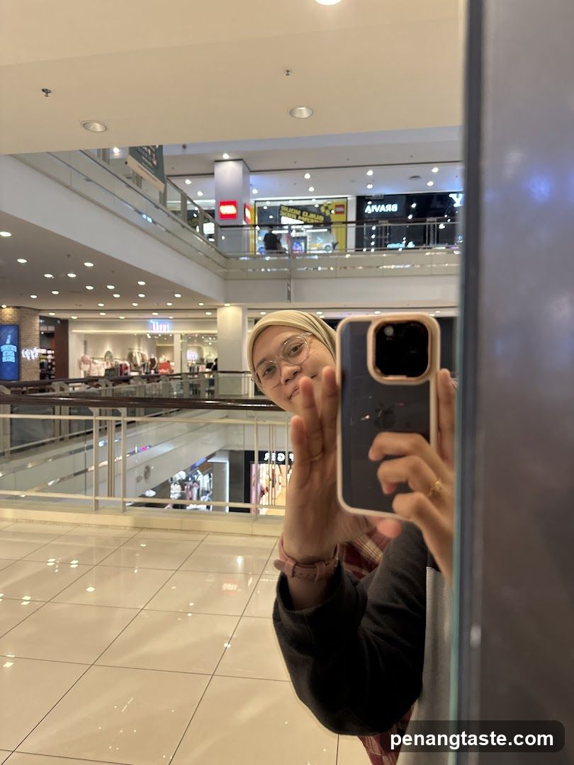 Mirror selfie in shopping mall