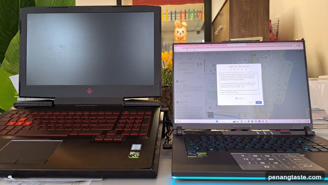 Laptops on desk with software window
