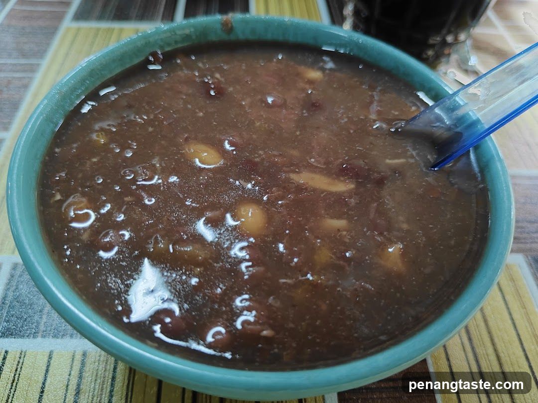 Bowl of Brown Porridge with Beans