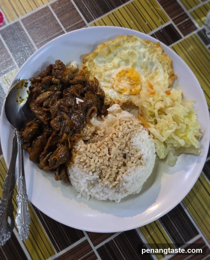 Plate of Fried Rice with Egg and Side Dishes