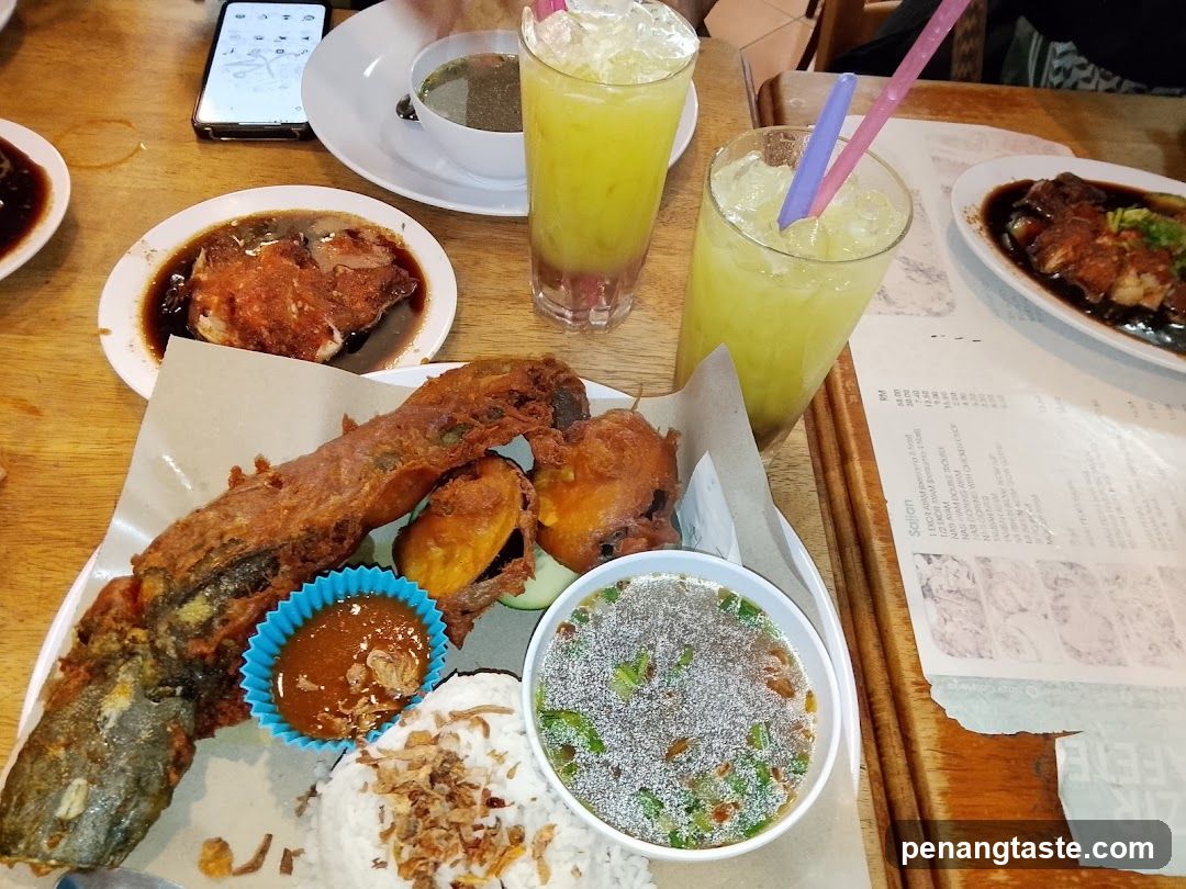 Fried Fish Meal with Rice and Drinks