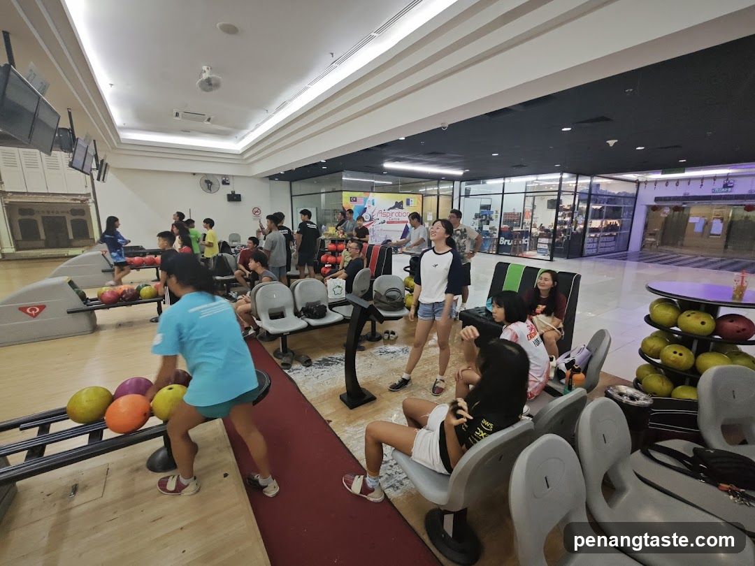 Bowling Alley Interior with Group of People