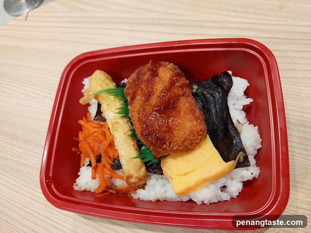 Japanese-style rice bowl with fried cutlet and egg