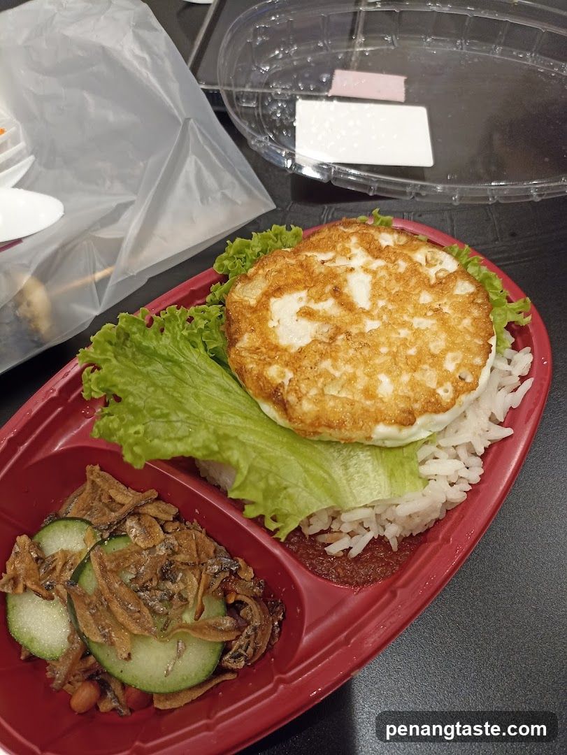 Food Tray with Fried Egg and Side Dishes
