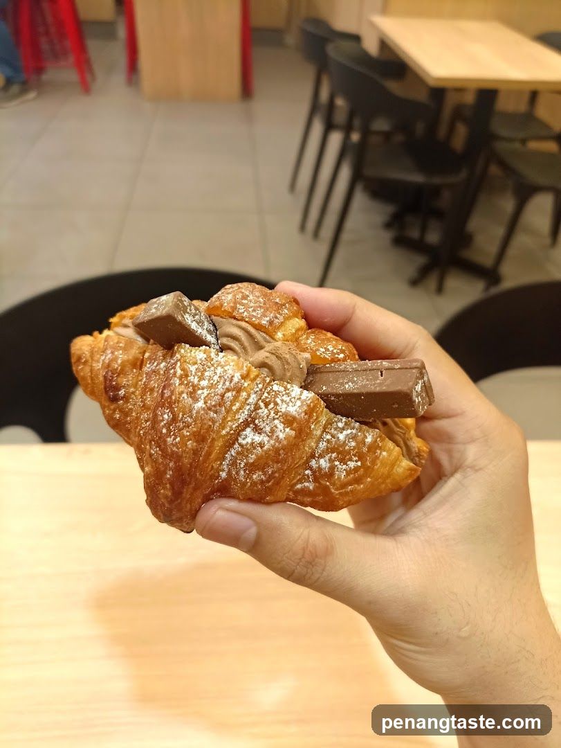 Chocolate Croissant with Powdered Sugar