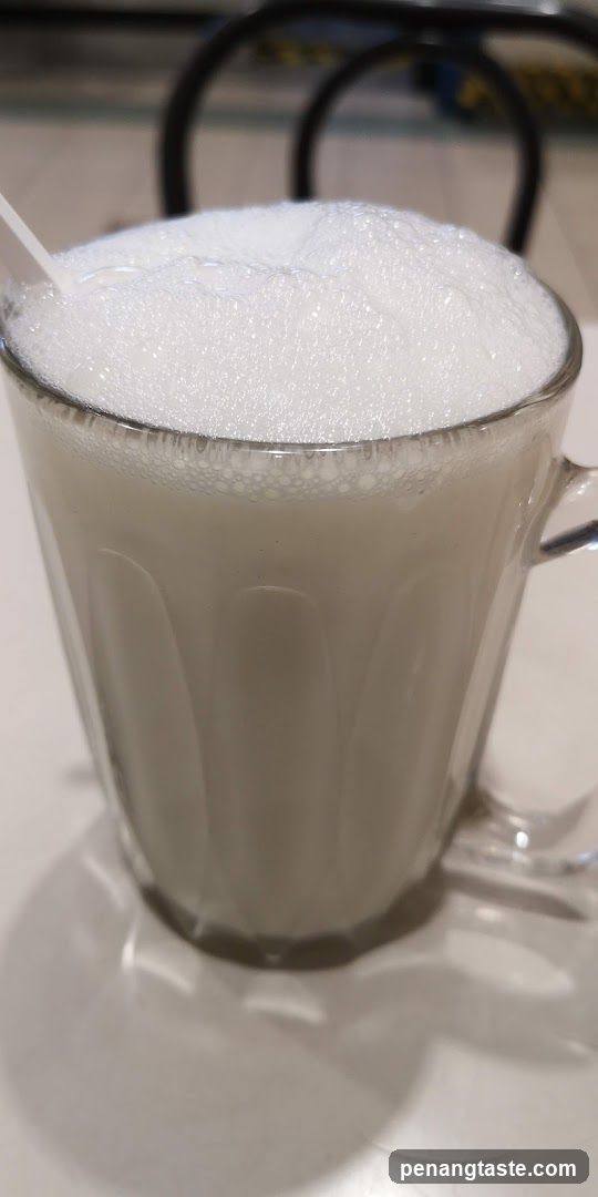Foamy Milk Drink in Glass Mug