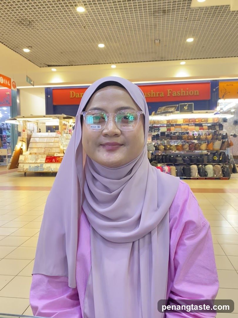 Woman in Pink Hijab at Mall Interior