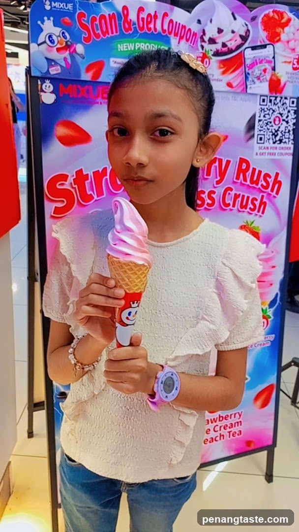 Girl holding ice cream cone in front of MIXUE advertisement
