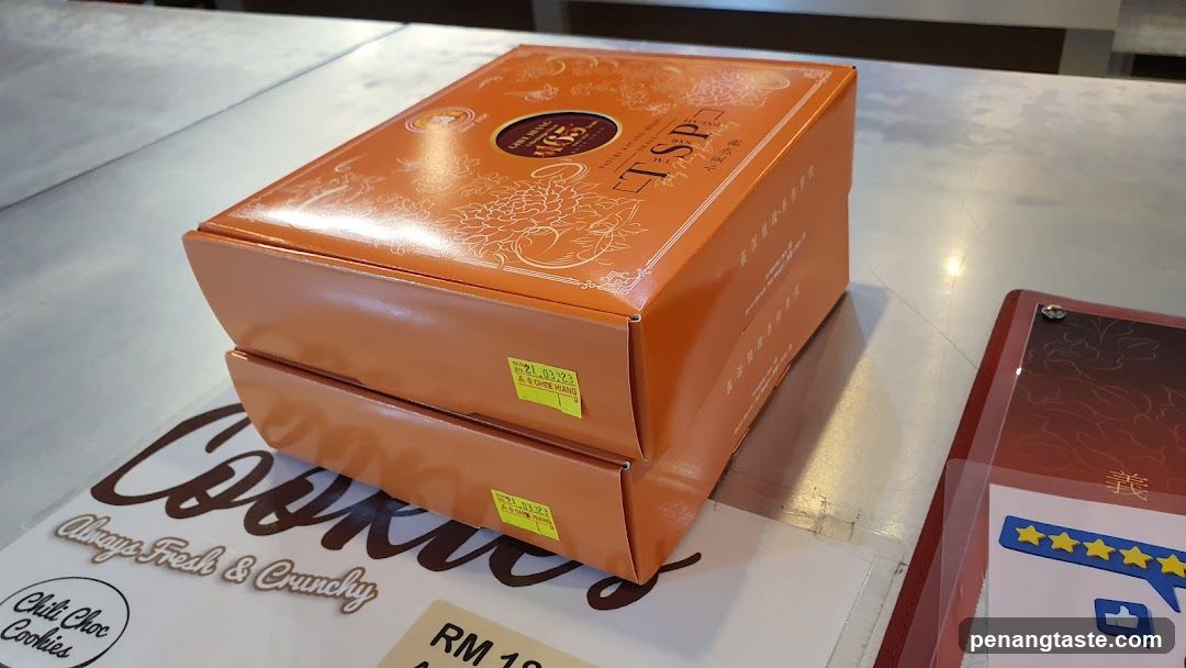 Orange Cookie Boxes on Counter