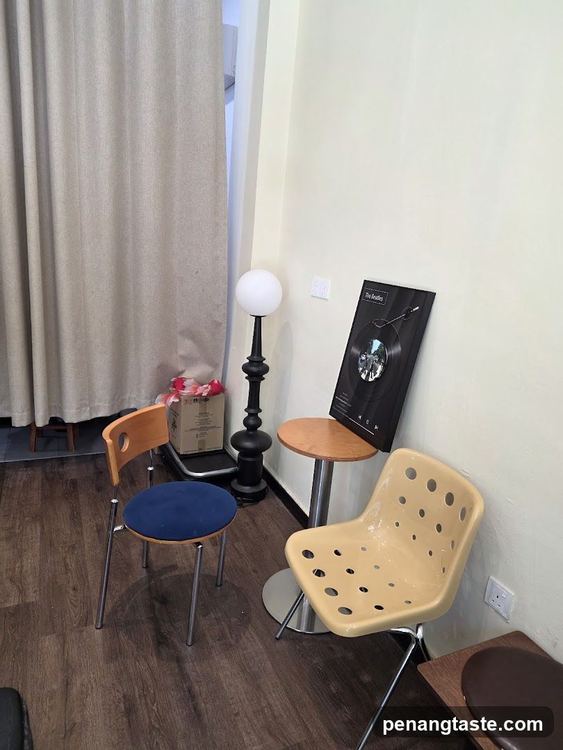 Interior seating area with chairs and lamp