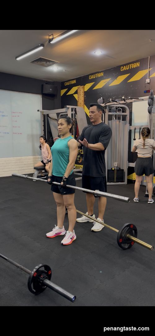 Gym Interior with Barbell Exercise