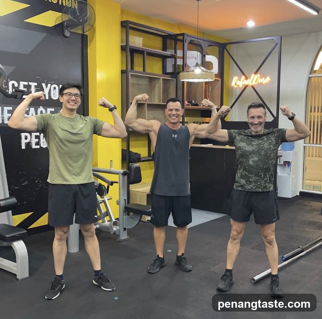 Gym Interior with Three Men Flexing