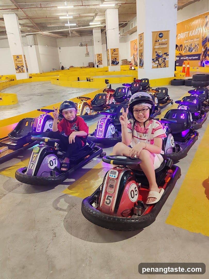 Kids in Go-Karts at Indoor Drift Track