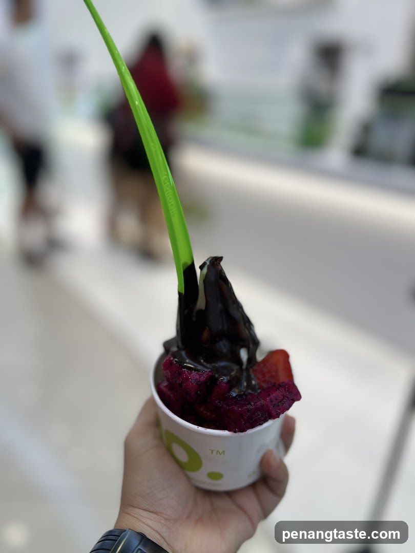 Handheld Dessert with Green Straw