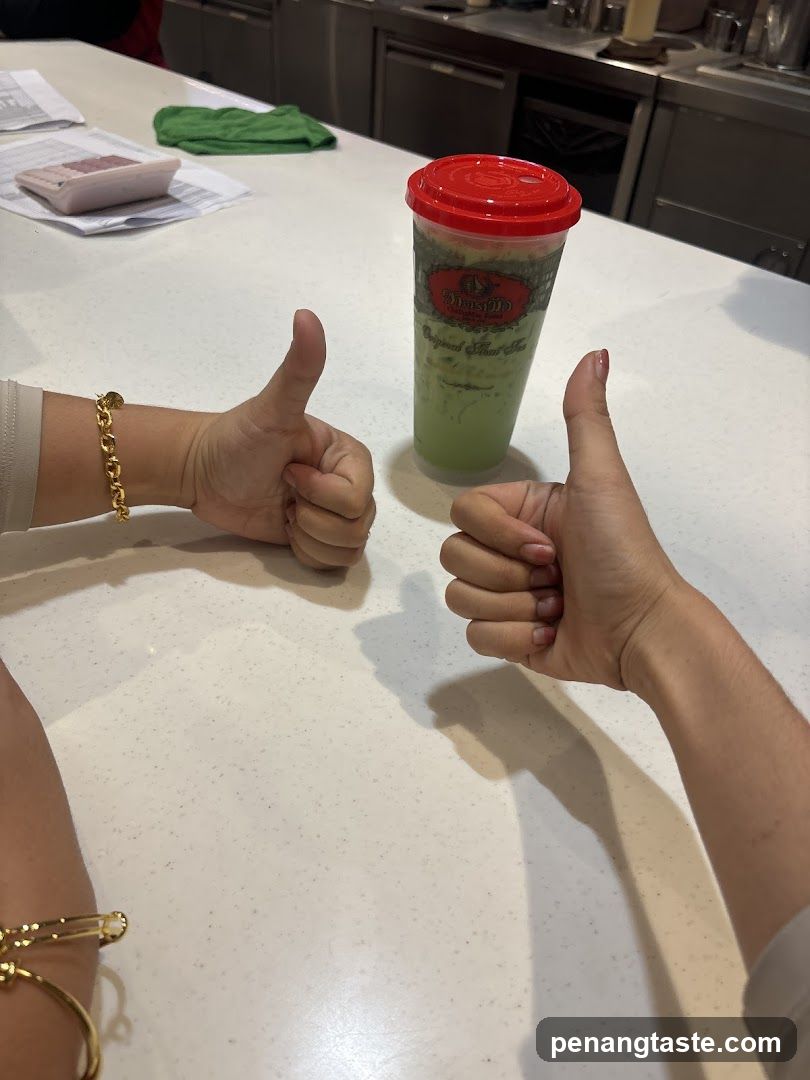 Green Drink with Thumbs Up