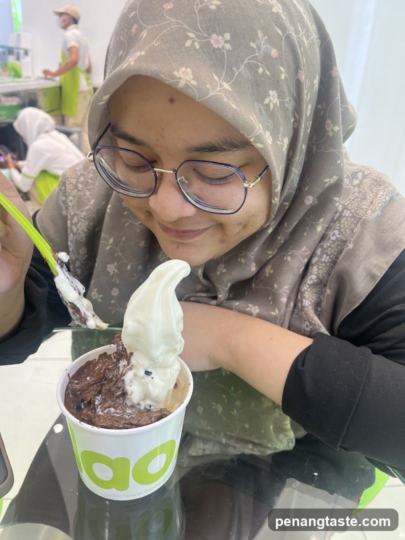 Person enjoying soft-serve ice cream