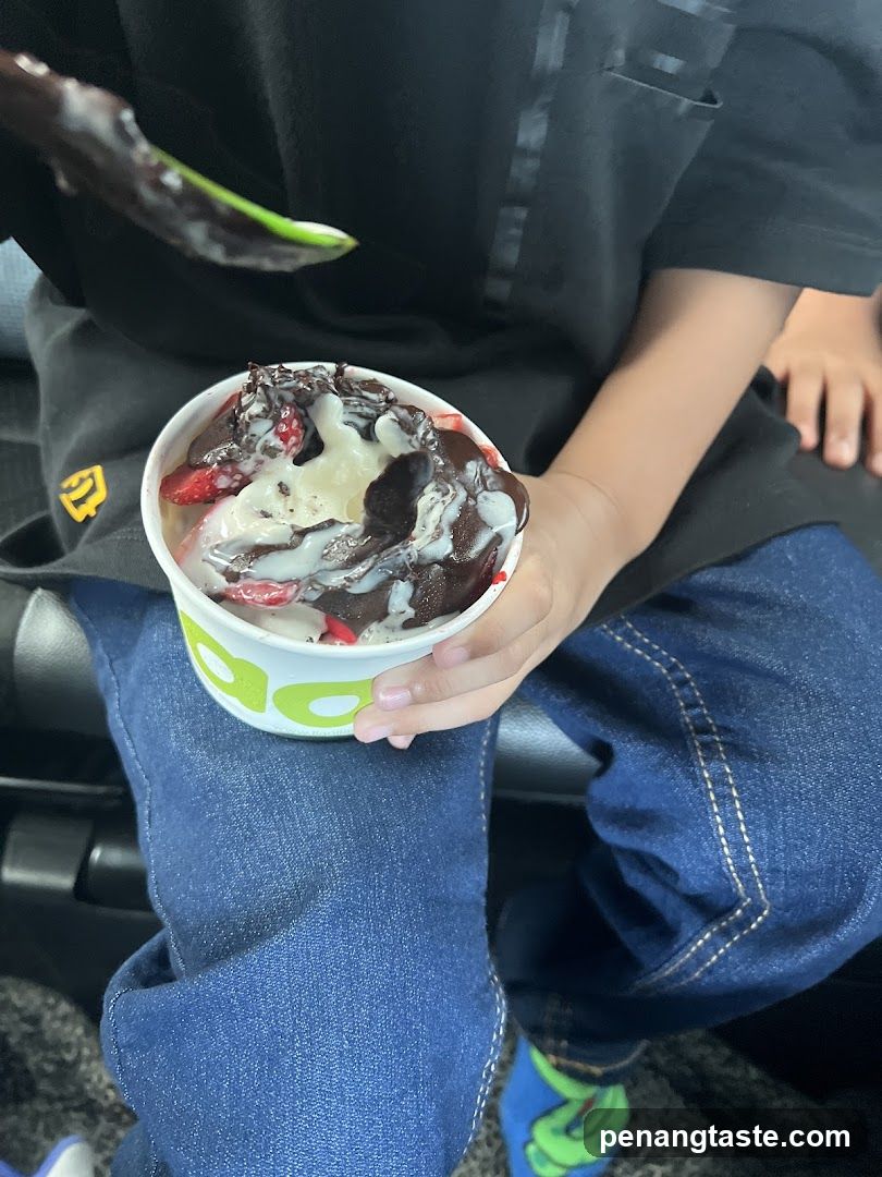 Child Holding Dessert Bowl