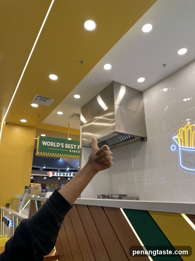 Interior of a fast food restaurant with thumbs-up gesture