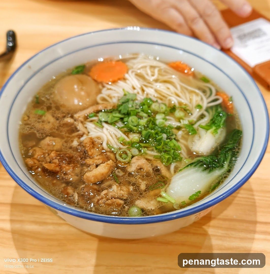 Bowl of Noodle Soup with Garnish