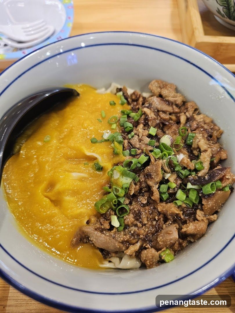 Bowl of Noodle Dish with Egg and Meat Topping