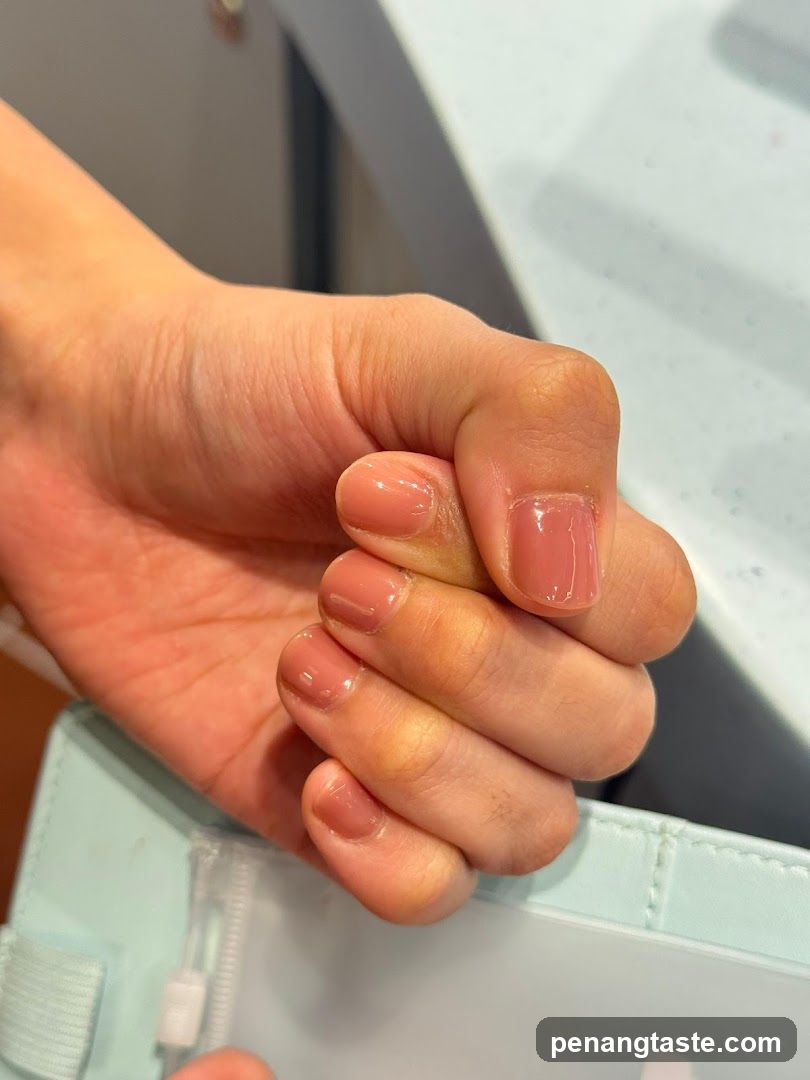 Hand with manicured nails