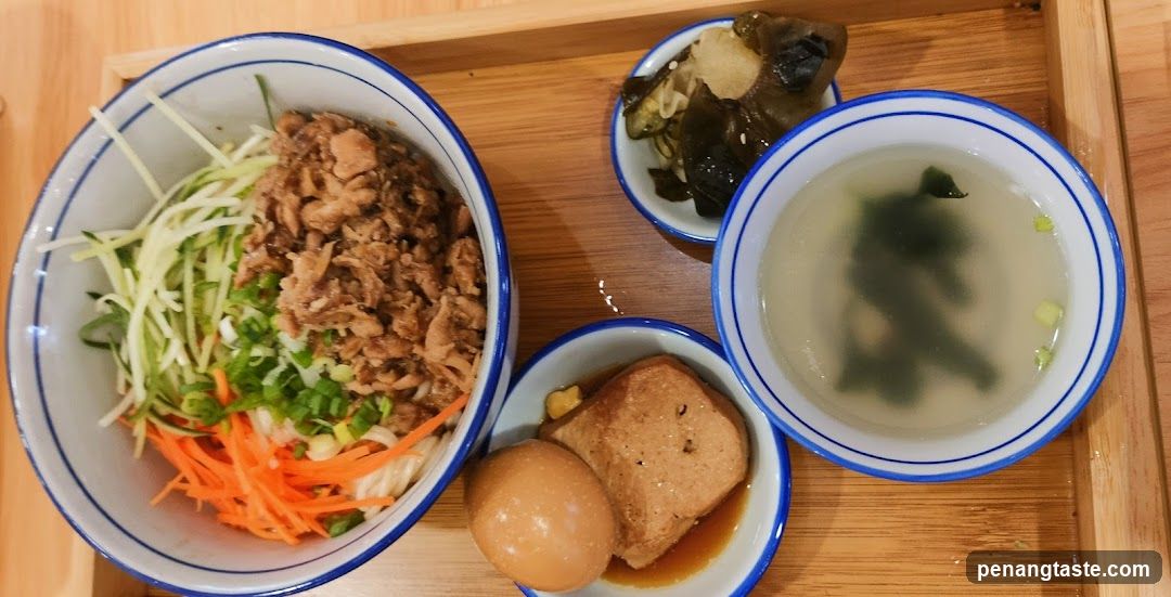 Bowl of food with sides