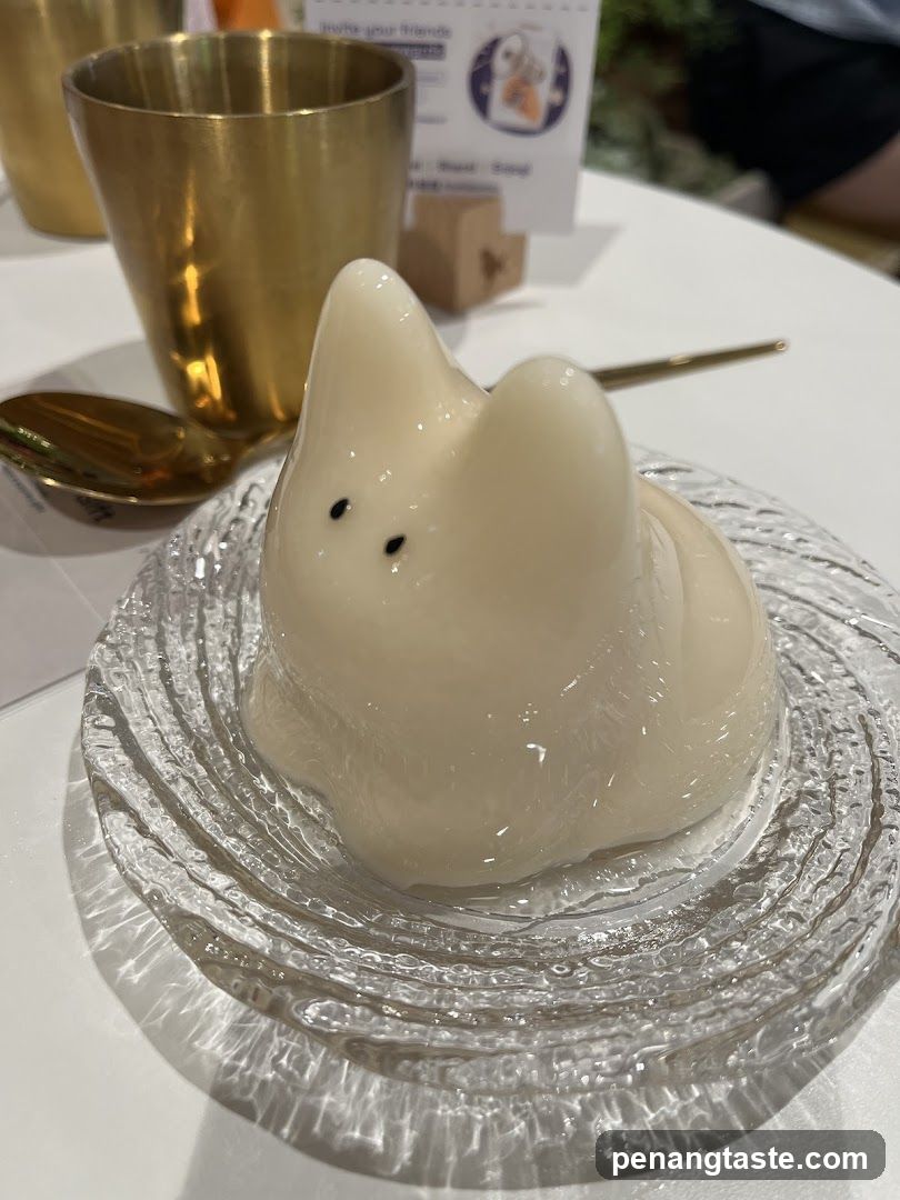 Cat-shaped dessert on glass plate