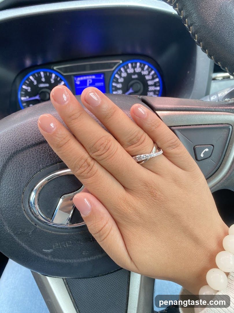 Hand on Steering Wheel