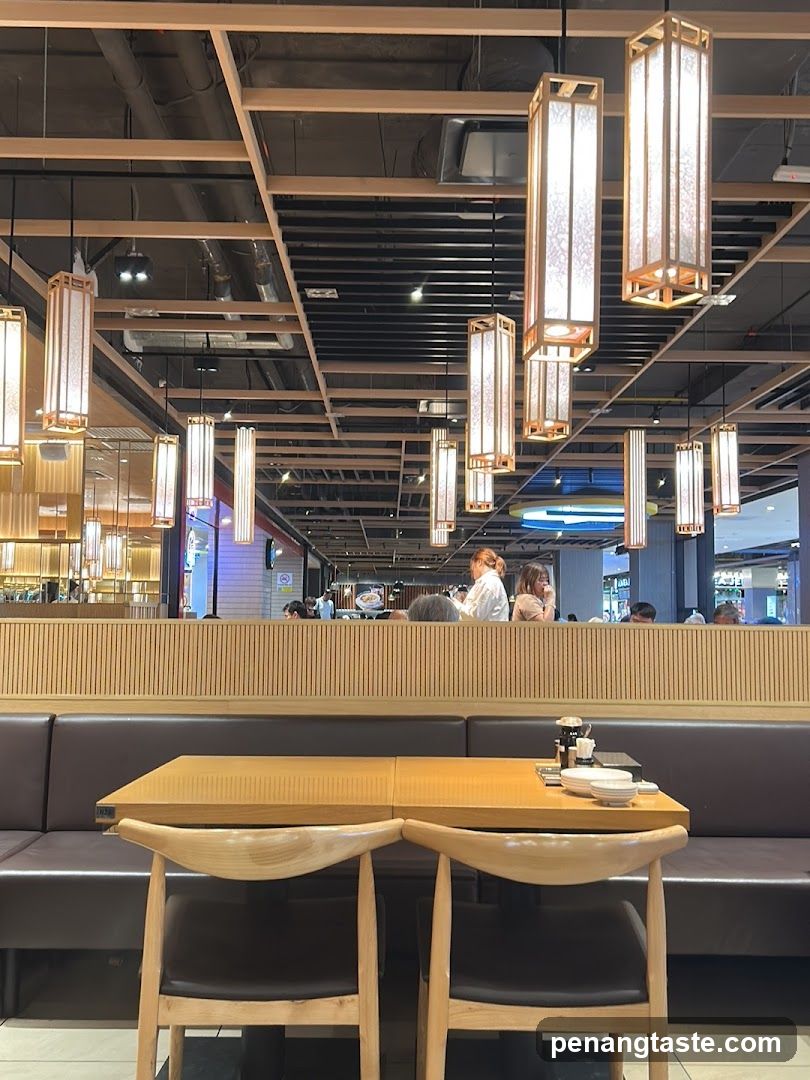 Restaurant Interior with Wooden Tables and Hanging Lights