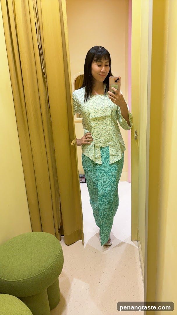 Woman Taking Mirror Selfie in Fitted Outfit