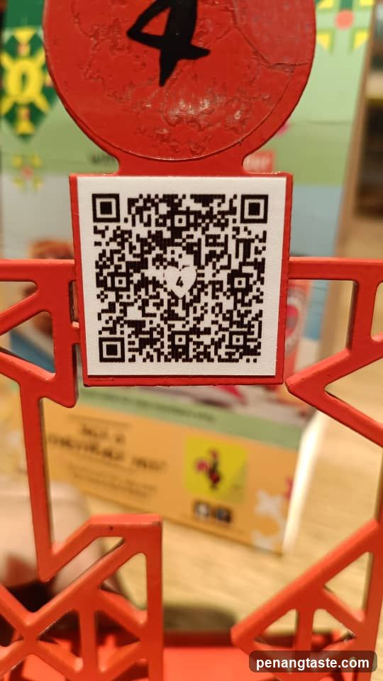 QR Code on Red Signage