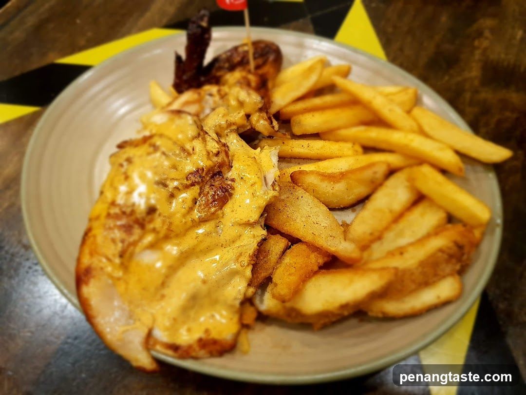 Cheese-covered Chicken with Fries