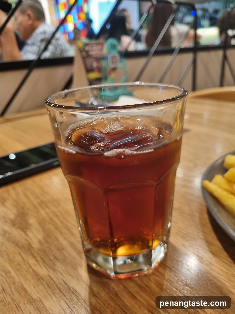 Beverage and Fries at Restaurant Table