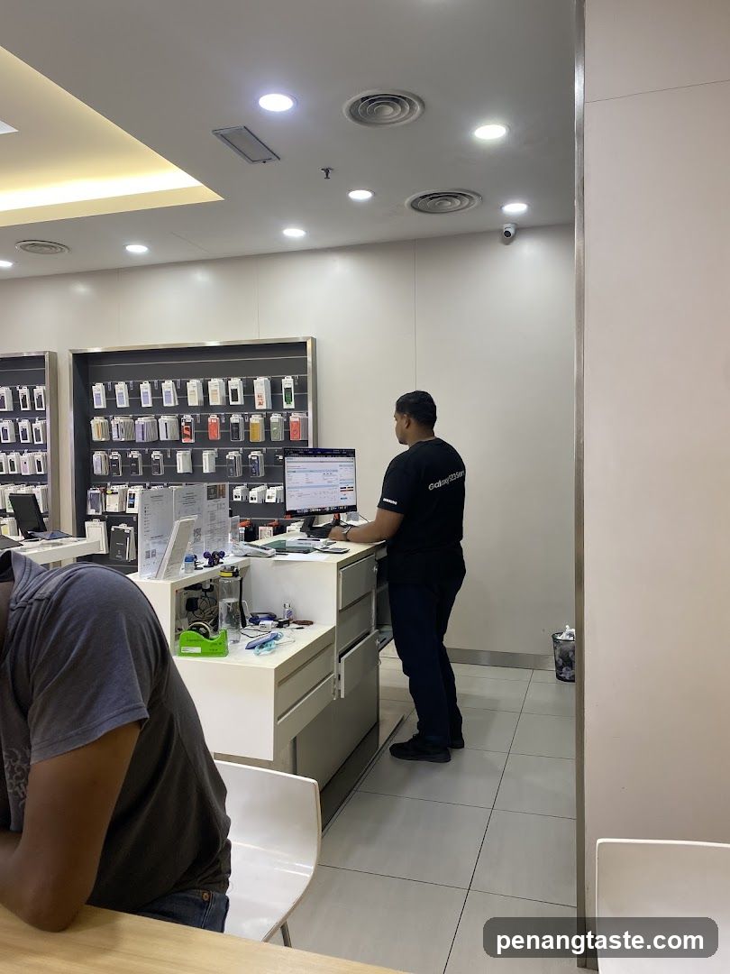 Store Interior with Staff and Customer