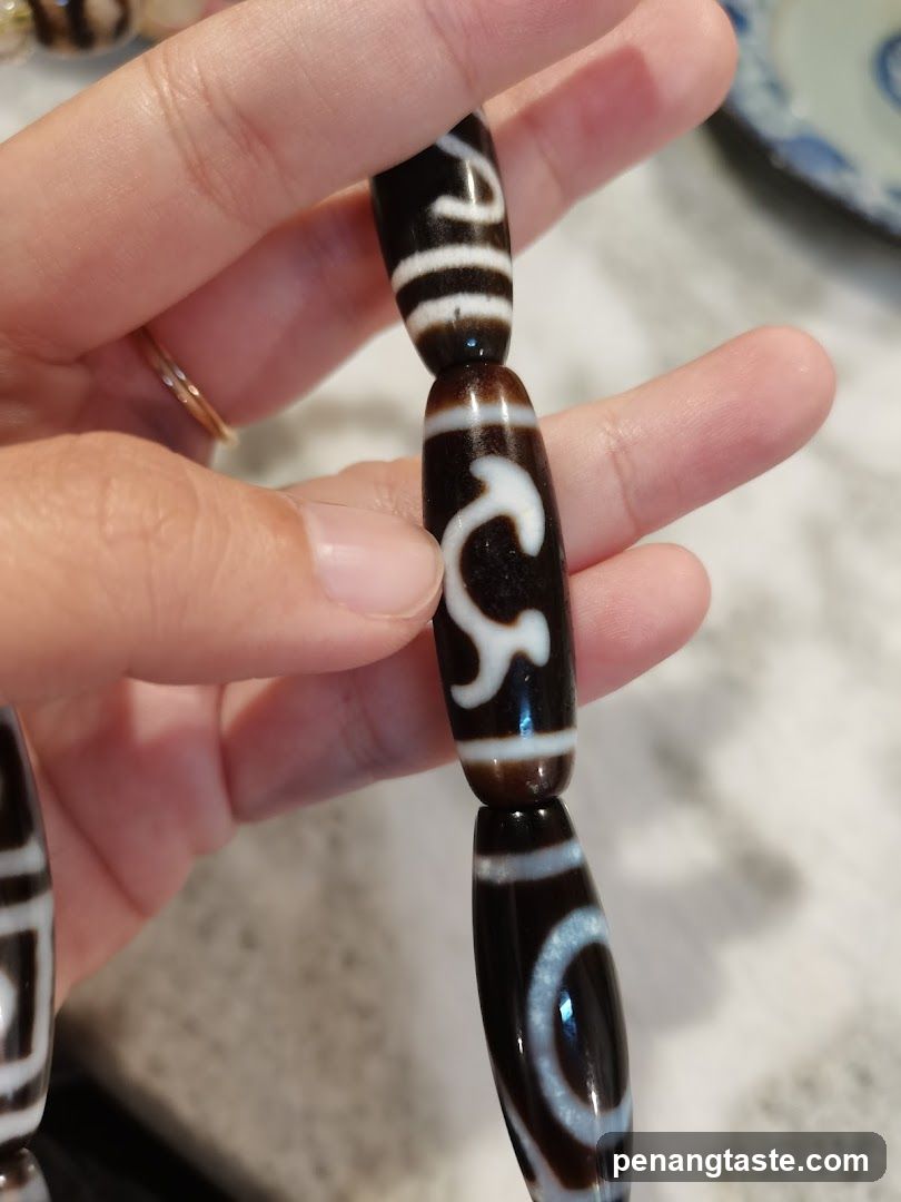 Hand holding beads