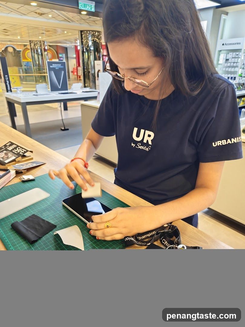Staff cleaning tablet in store