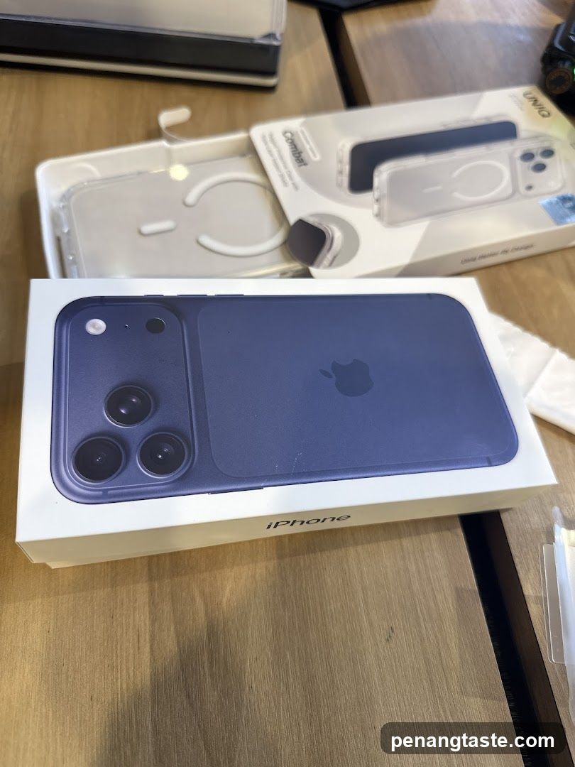 iPhone Box and Accessories on Table