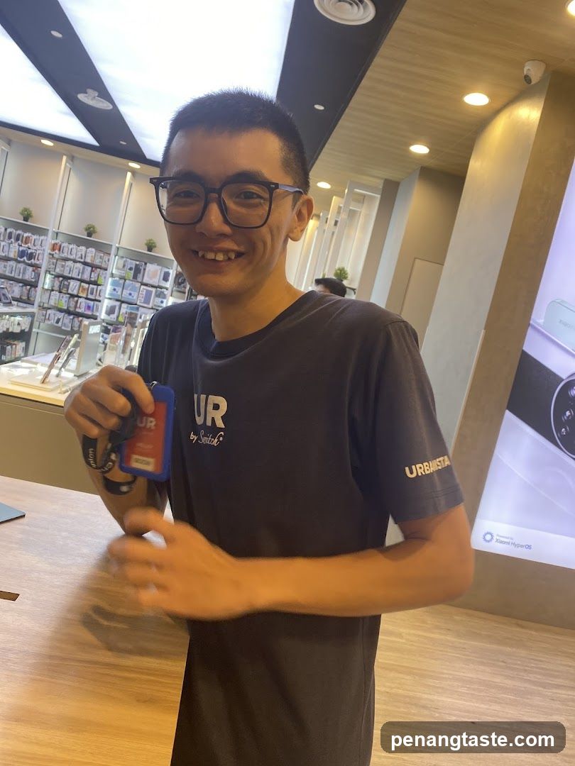 Store Staff Holding ID Card