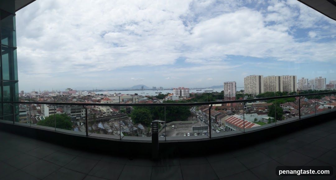 Cityscape View from High-Rise Balcony