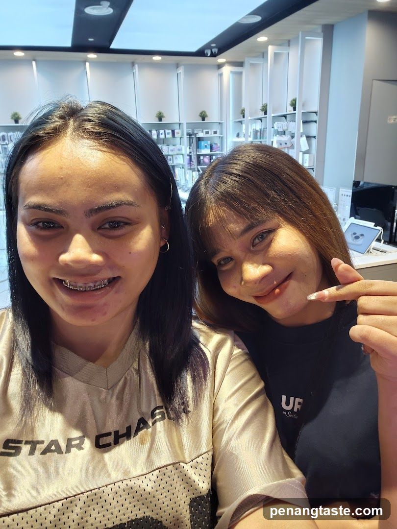 Two women inside a modern store